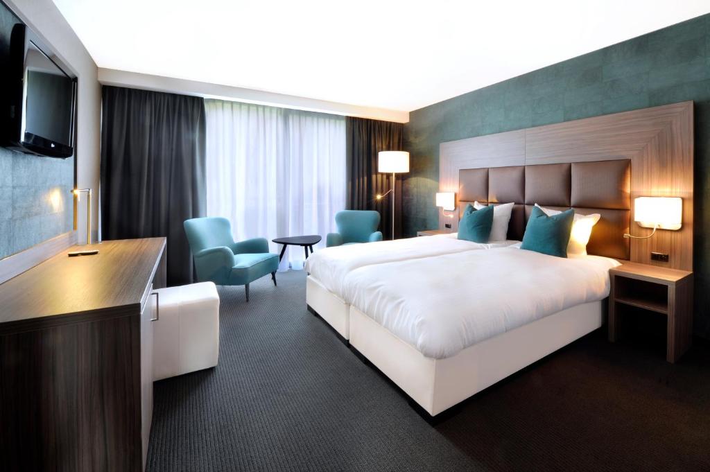 Двухместный (Улучшенный двухместный номер с 2 отдельными кроватями и видом на лес) отеля Van der Valk Hotel Nazareth-Gent, Гент