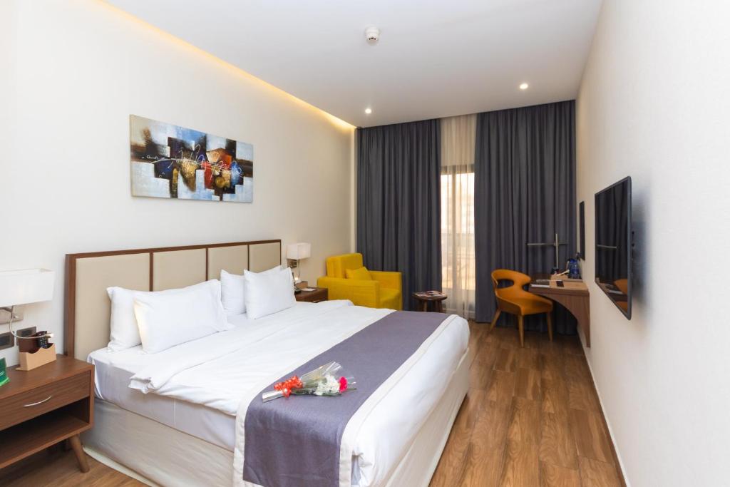 Двухместный (Представительский двухместный номер с 1 кроватью или 2 отдельными кроватями) отеля Le Wana Hotel, Дубай