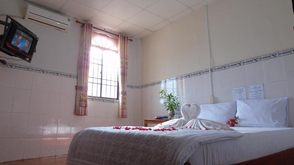 Двухместный (Двухместный номер с 1 кроватью и собственной ванной комнатой) отеля Nhật Thanh Hostel, Дуонг-Донг