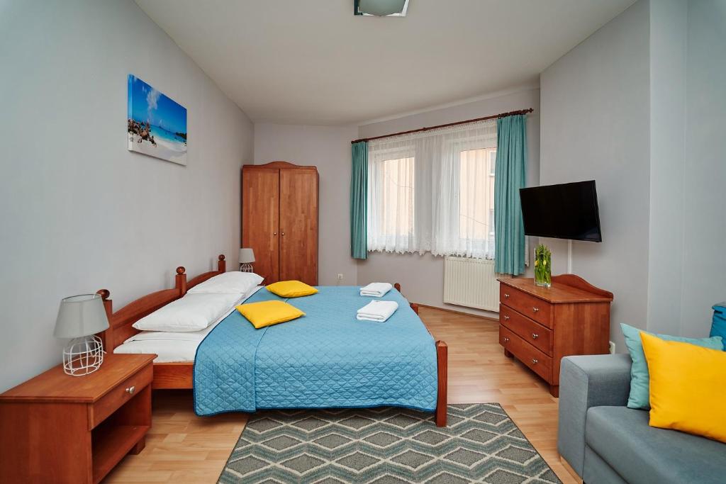 Двухместный (Двухместный номер с 1 кроватью и диваном-кроватью) гостевого дома Hotelik Gołdap, Голдап