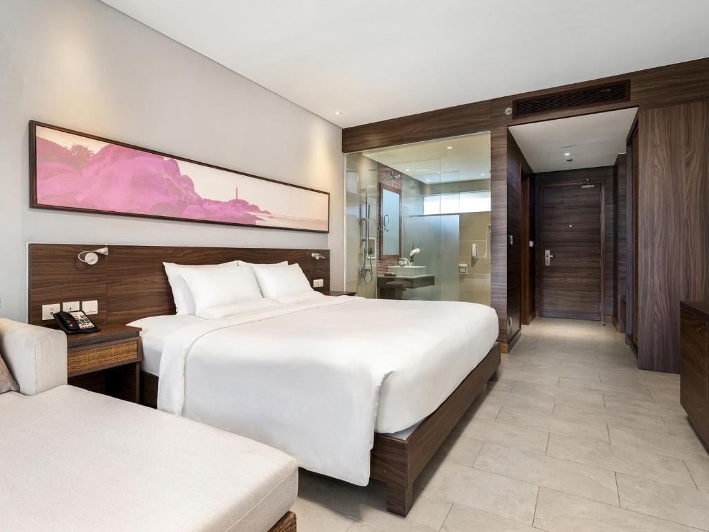Двухместный (Улучшенный двухместный номер с 1 кроватью) курортного отеля Novotel Phu Quoc Resort, Дуонг-Донг