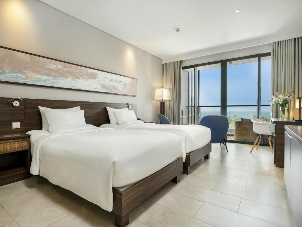Двухместный (Улучшенный двухместный номер с 2 отдельными кроватями и видом на океан) курортного отеля Novotel Phu Quoc Resort, Дуонг-Донг