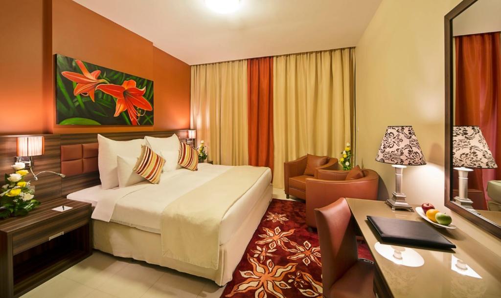 Апартаменты (Апартаменты с 2 спальнями - В стоимость входит поздняя регистрация отъезда до 14:00, ранняя регистрация заезда до 12:00 и скидка 25% на еду и напит�) апарт-отеля Abidos Hotel Apartment Dubai Land, Дубай