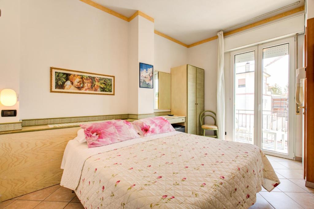 Двухместный (Двухместный номер с 1 кроватью или 2 отдельными кроватями) отеля Hotel Residence Charles, Римини