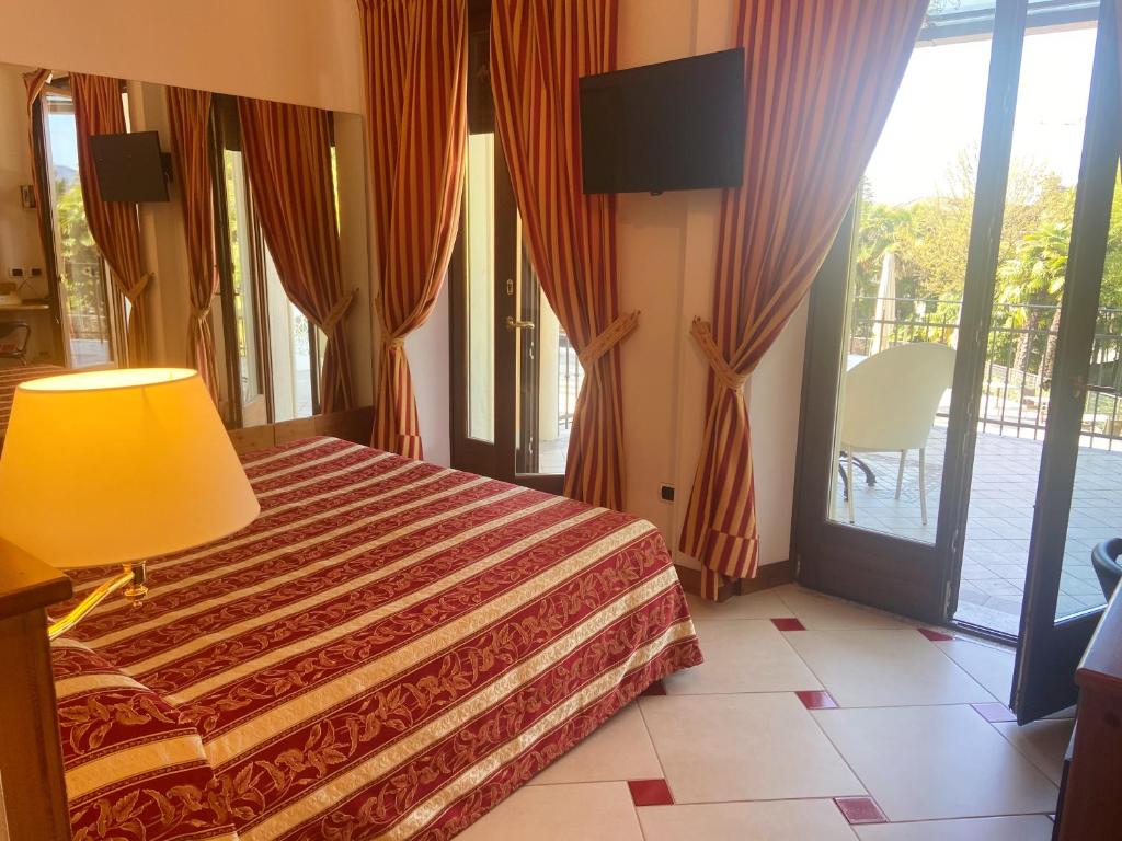 Двухместный (Двухместный номер с 1 кроватью и террасой) отеля Arciduca Charming House Room & Breakfast, Арко