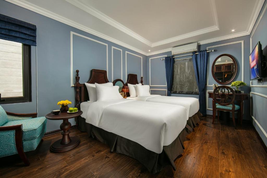 Двухместный (Двухместный номер Делюкс с 2 отдельными кроватями) отеля Romantique Hotel De Hanoi, Ханой