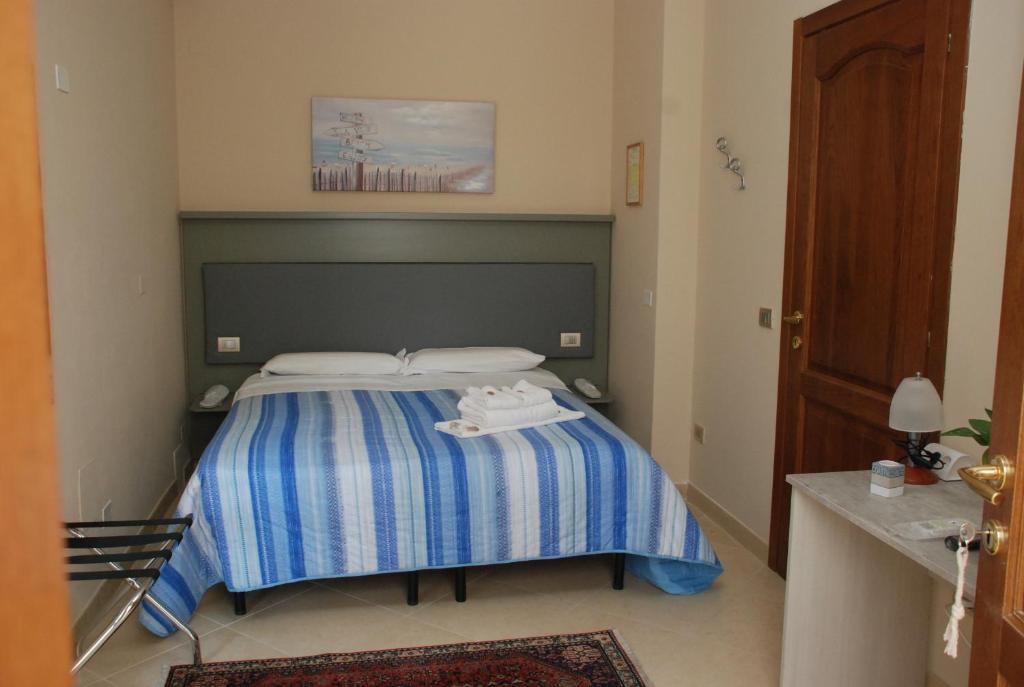 Двухместный (Двухместный номер с 1 кроватью или 2 отдельными кроватями) отеля B&B La Regina di Rimini, Римини