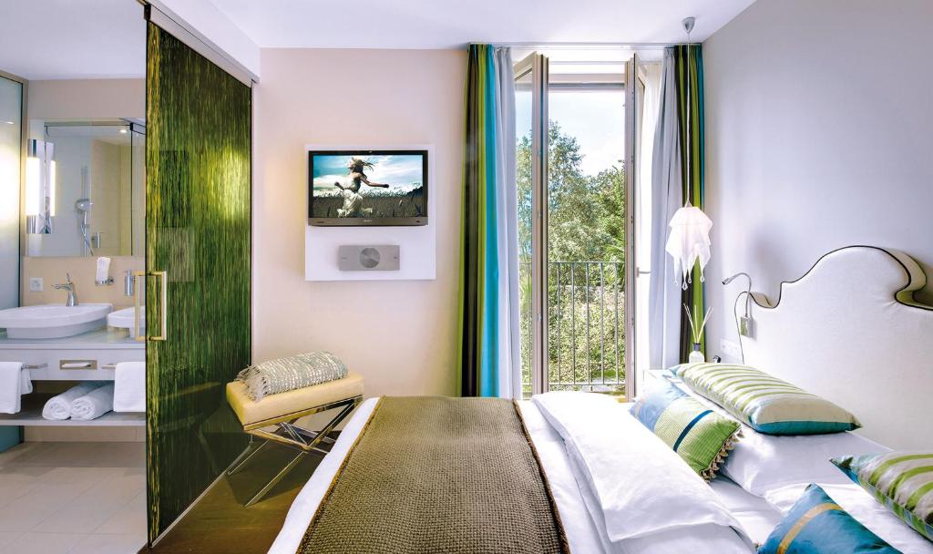 Двухместный (Небольшой двухместный номер с 1 кроватью) отеля Giardino Lago, Локарно