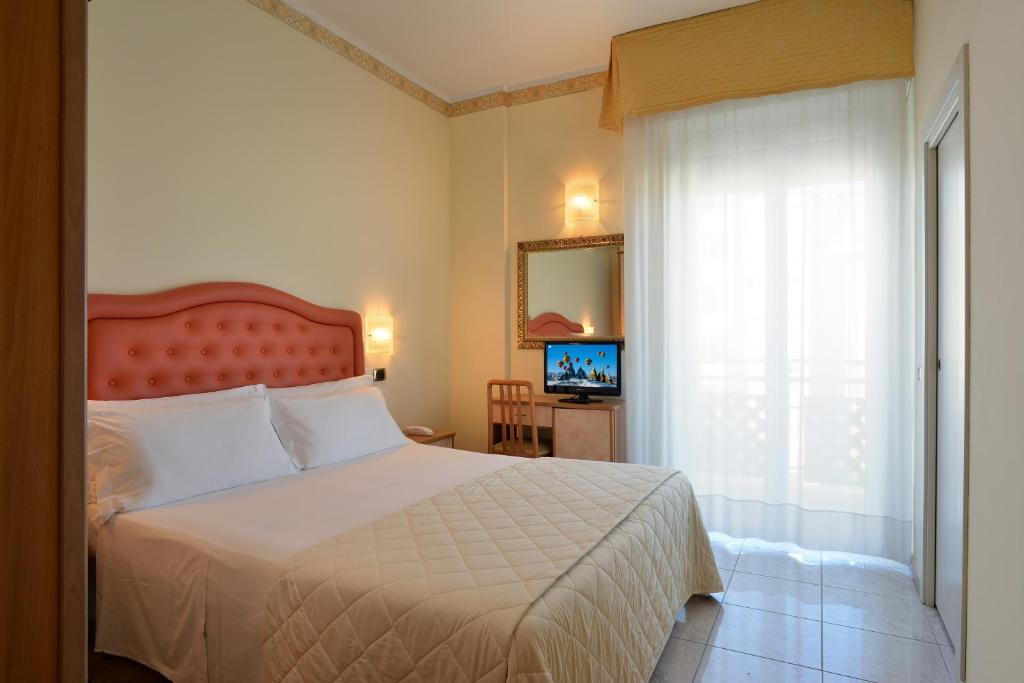 Двухместный (Двухместный номер с 1 кроватью или 2 отдельными кроватями) отеля Hotel Gaston, Римини