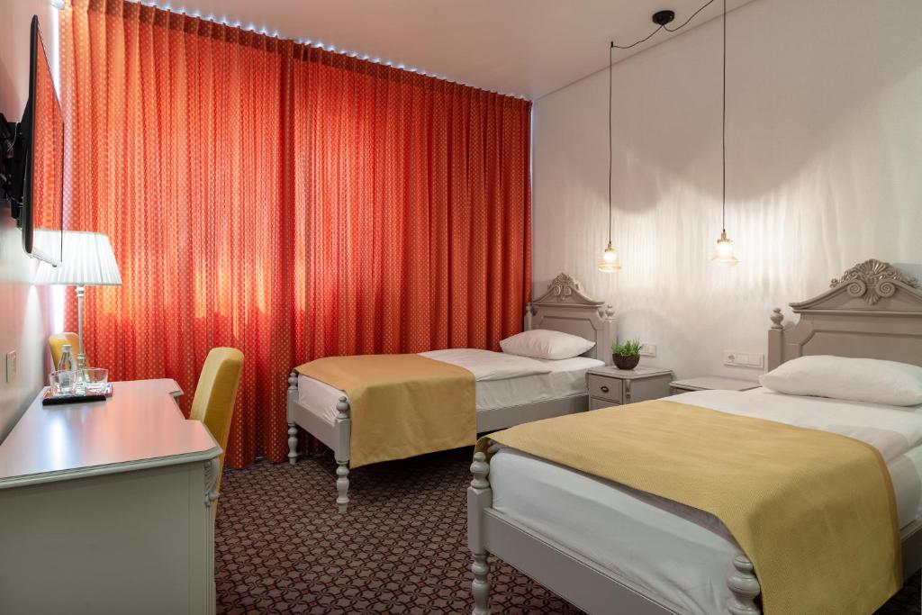 Двухместный (Бюджетный двухместный номер с 2 отдельными кроватями) отеля Guesthouse Sinchronas, Тельшай