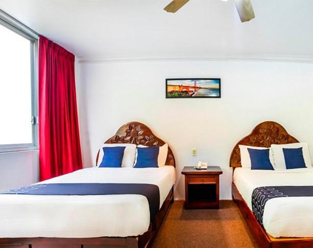 Двухместный (Стандартный двухместный номер с 2 двуспальными кроватями) отеля Hotel Cano, Селайя