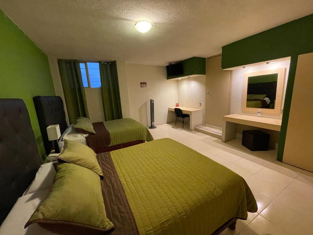 Двухместный (Стандартный двухместный номер с 2 отдельными кроватями) отеля Hotel Santa Julia, Теккачакалько