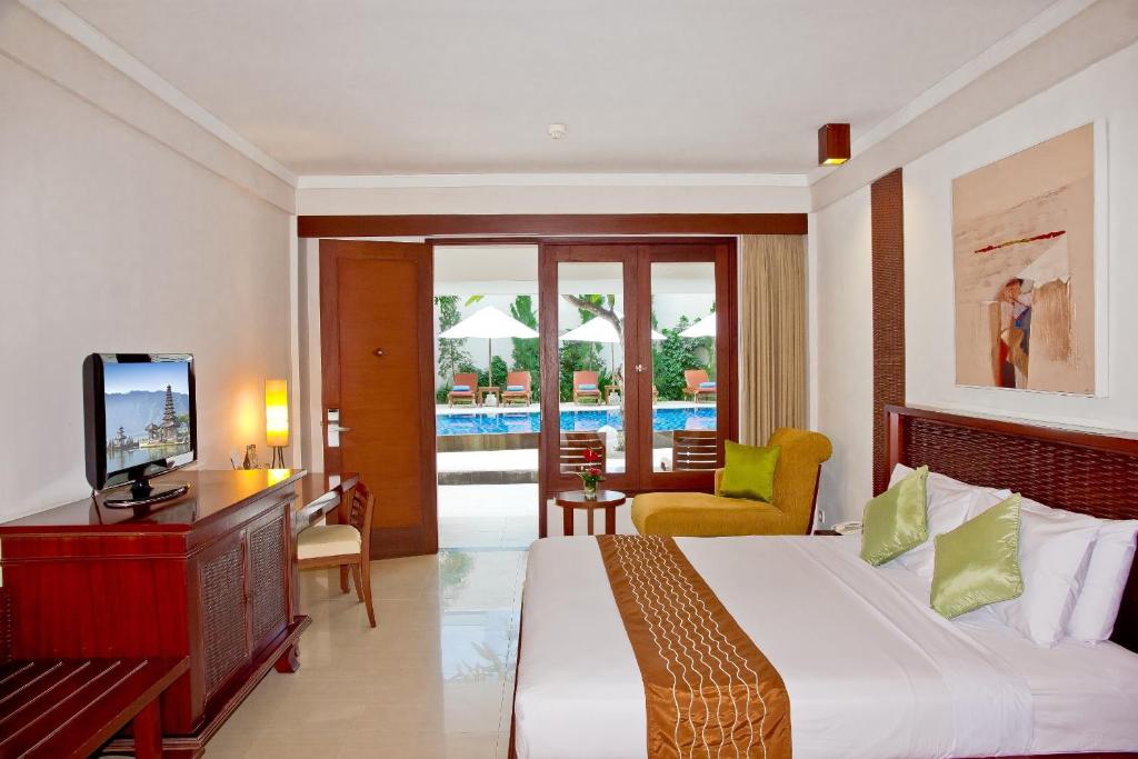 Двухместный (Двухместный номер Делюкс с 1 кроватью или 2 отдельными кроватями, доступ к бассейну) отеля The Rani Hotel & Spa, Кута