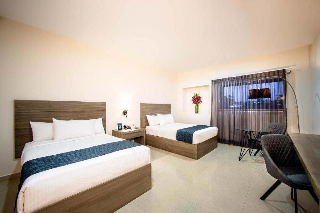 Двухместный (Двухместный номер Делюкс с 2 отдельными кроватями) отеля Hotel Monterreal, Кульякан