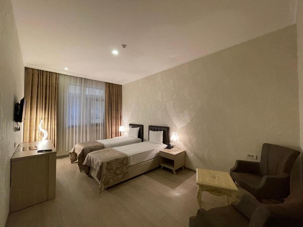 Двухместный (Стандартный двухместный номер с 2 отдельными кроватями) отеля Аммар, Баку