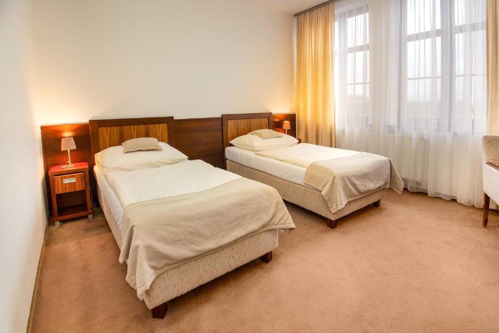 Двухместный (Двухместный номер с 1 кроватью или 2 отдельными кроватями) отеля Hotel Academic, Зволен