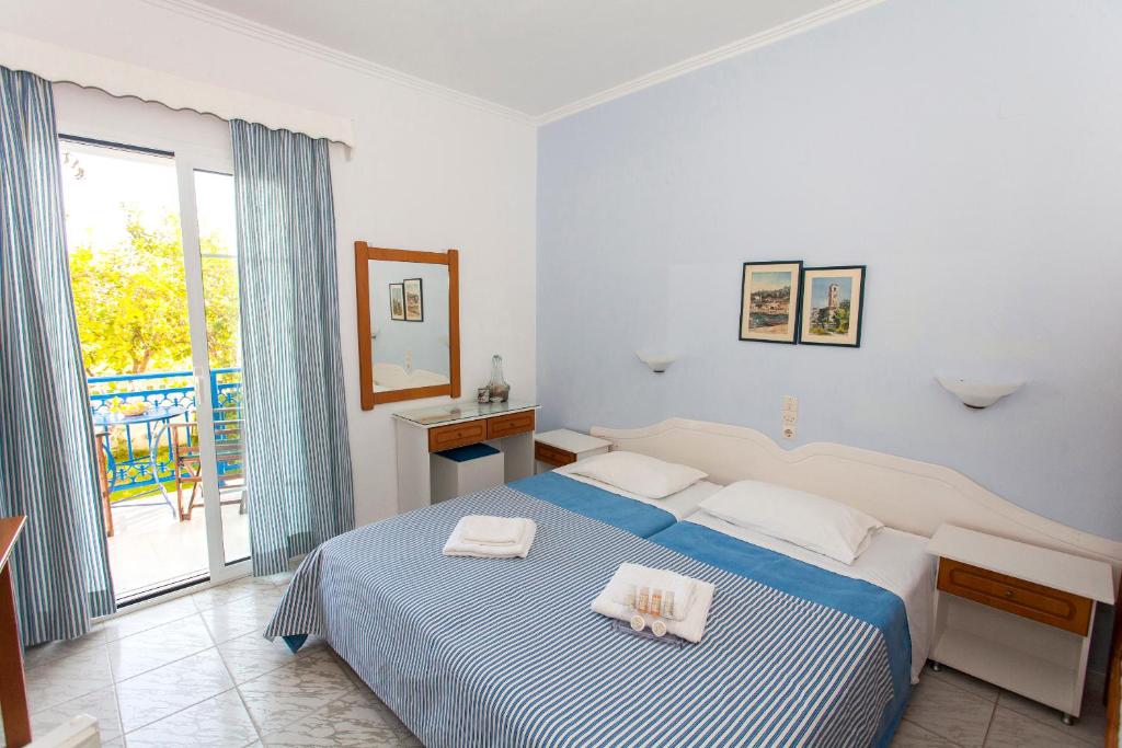 Двухместный (Стандартный двухместный номер с 2 отдельными кроватями и видом на сад) отеля Villa Ionio, Аммудия