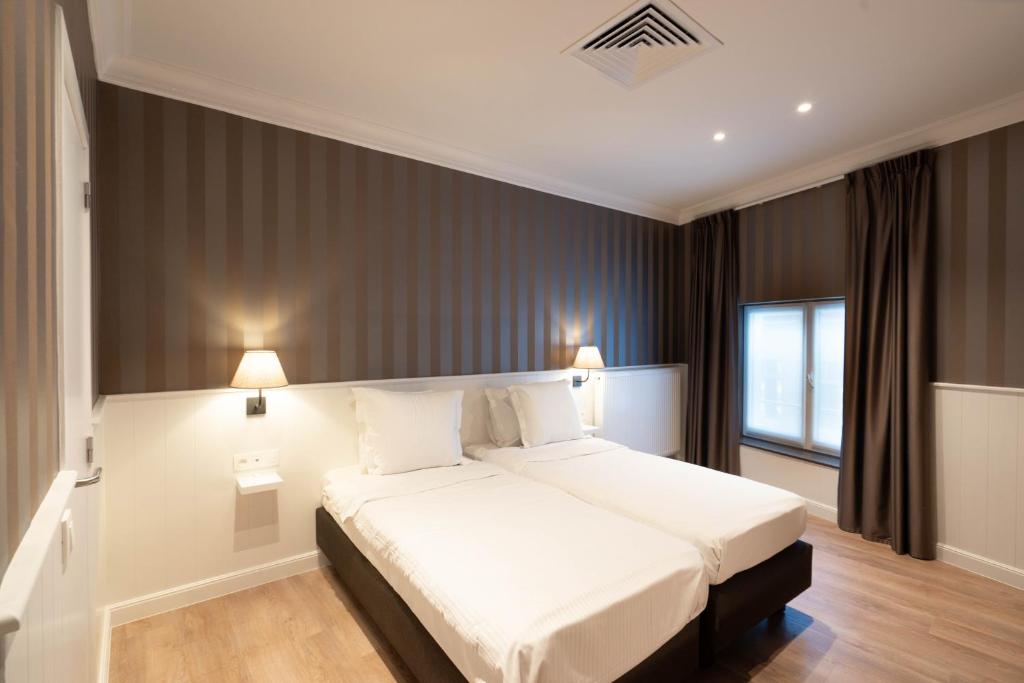 Двухместный (Стандартный двухместный номер с 2 отдельными кроватями) отеля Hans Memling Hotel, Брюгге