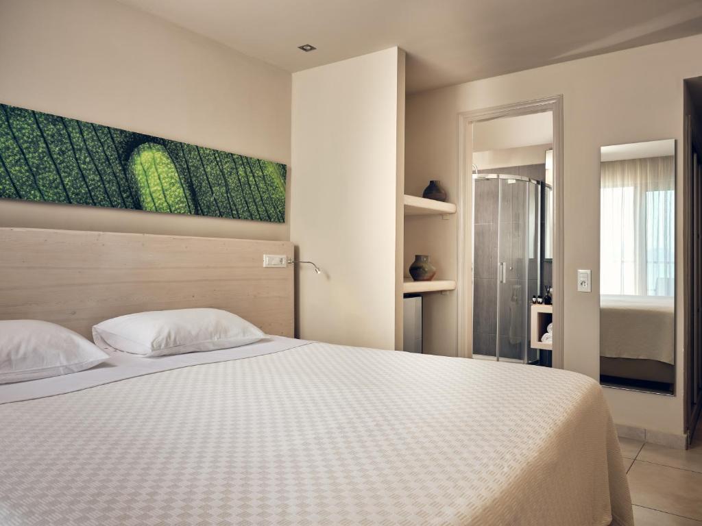 Двухместный (Двухместный номер Делюкс с 1 кроватью или 2 отдельными кроватями, панорамный вид на море и на бассейн (для 2 взрослых)) отеля Ionian Hill Hotel, Аргасион