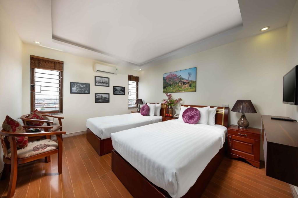 Двухместный (Двухместный номер с 2 отдельными кроватями и ванной) отеля Viet Village Hotel & Travel, Ханой