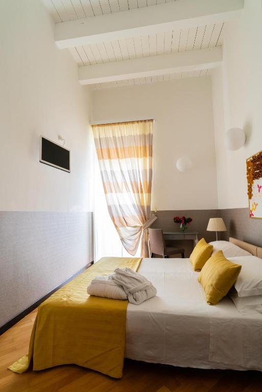 Двухместный (Улучшенный двухместный номер с 1 кроватью или 2 отдельными кроватями) отеля Palazzo Indelli, Монополи