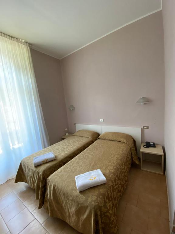 Двухместный (Двухместный номер с 2 отдельными кроватями) отеля Hotel Atena, Милан