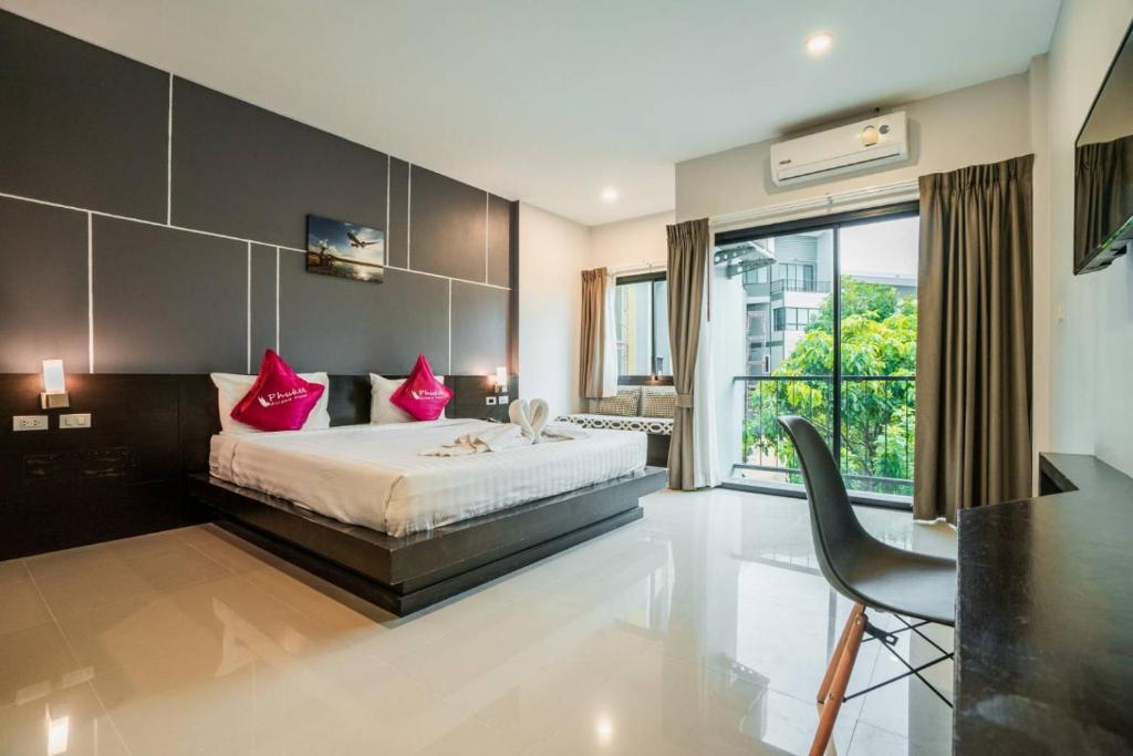 Двухместный (Улучшенный двухместный номер с 1 кроватью или 2 отдельными кроватями и видом на сад) отеля Phuket Airport Place, Пхукет