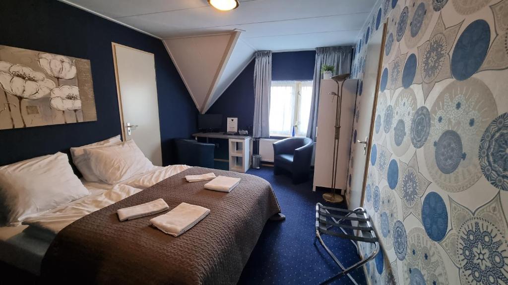 Двухместный (Стандартный двухместный номер с 2 отдельными кроватями) отеля Hotel de Pergola, Гронинген