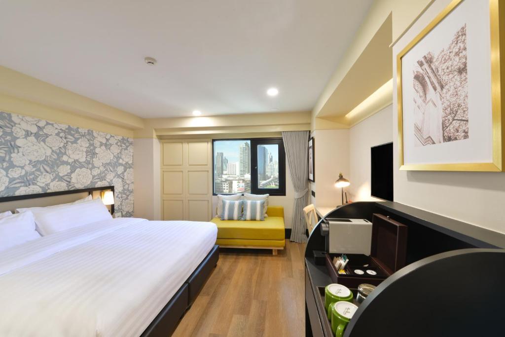 Двухместный (Двухместный номер Делюкс с 1 кроватью или 2 отдельными кроватями) отеля Astera Sathorn, Бангкок