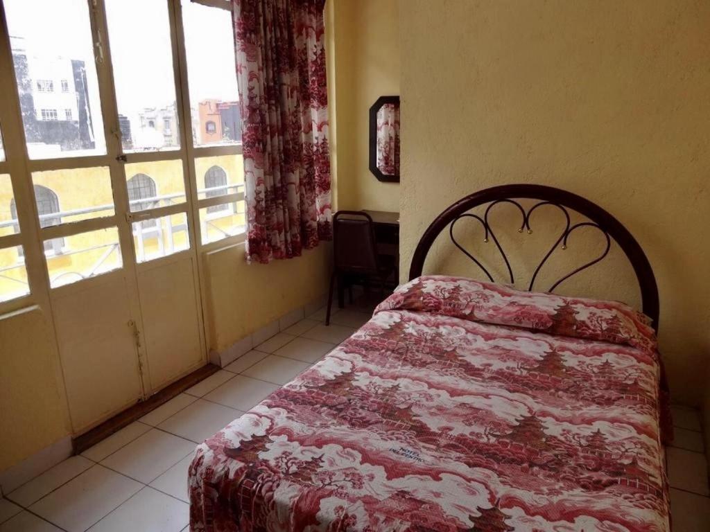 Двухместный (Двухместный номер с 1 кроватью или 2 отдельными кроватями) отеля Hotel Del Centro, Пуэбла
