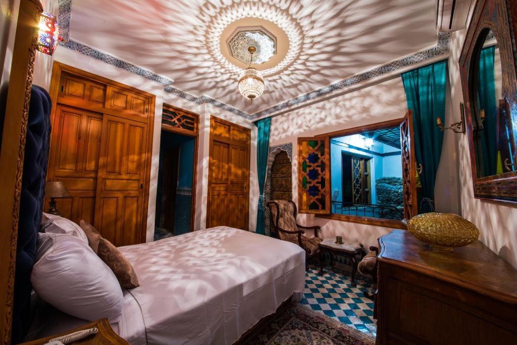 Трехместный (Трехместный номер с основными удобствами и общей ванной комнатой) отеля Riad Scalia Fez, Фес