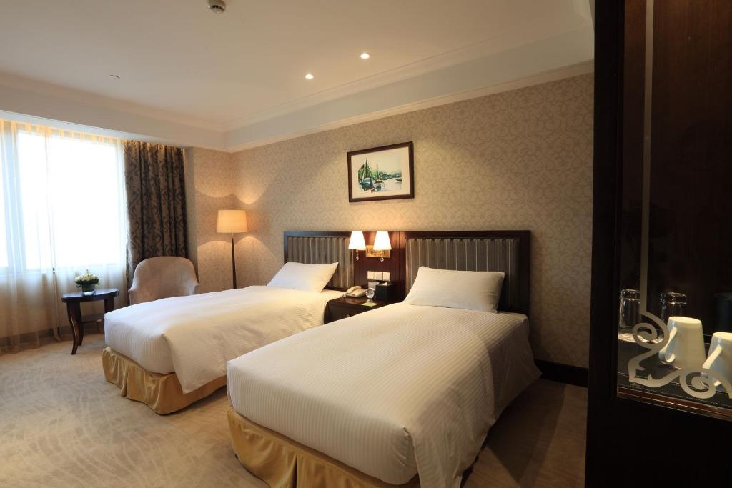 Двухместный (Стандартный двухместный номер с 2 отдельными кроватями) отеля Evergreen Laurel Hotel, Shanghai, Шанхай