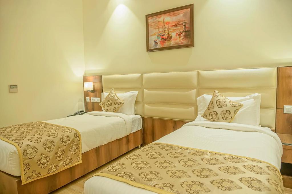 Двухместный (Улучшенный двухместный номер с 1 кроватью или 2 отдельными кроватями) отеля Hotel Hira Inn, Аллахабад