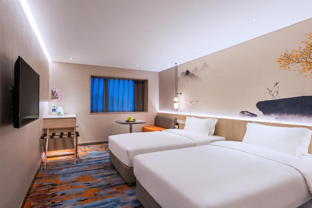 Двухместный (Двухместный номер бизнес-класса с 2 отдельными кроватями) отеля Sunworld Hotel Wangfujing, Пекин