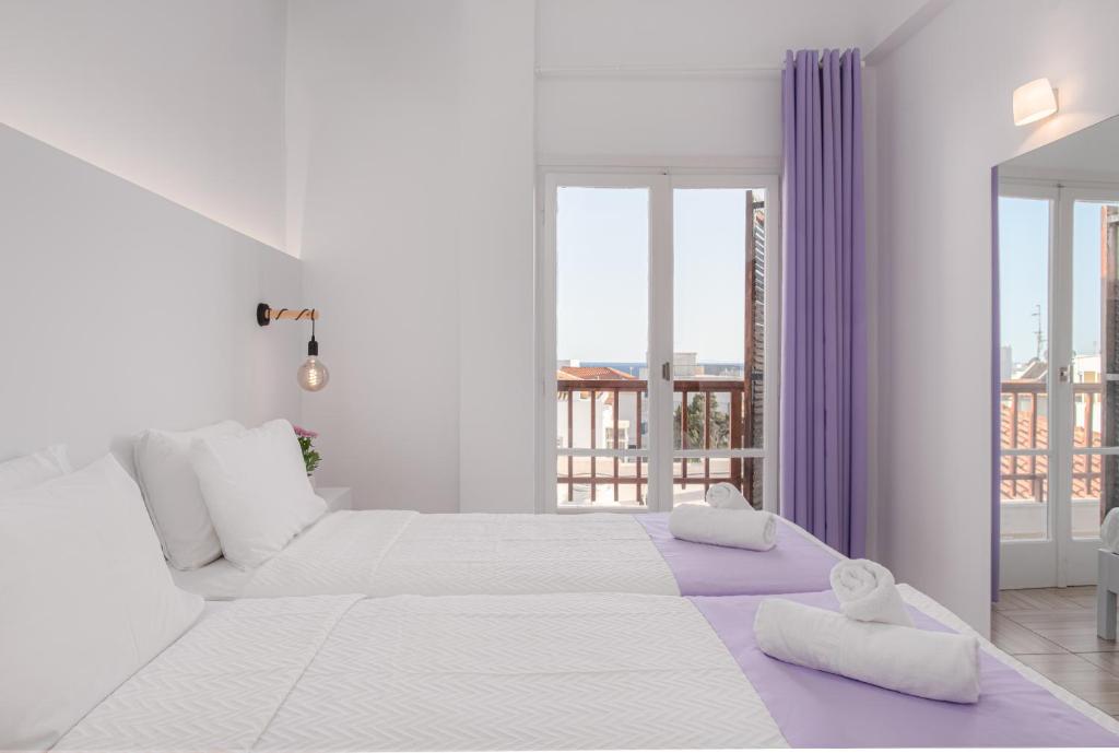 Двухместный (Стандартный двухместный номер с 1 кроватью или 2 отдельными кроватями и балконом) отеля Venus Minimal Hotel, Тинос