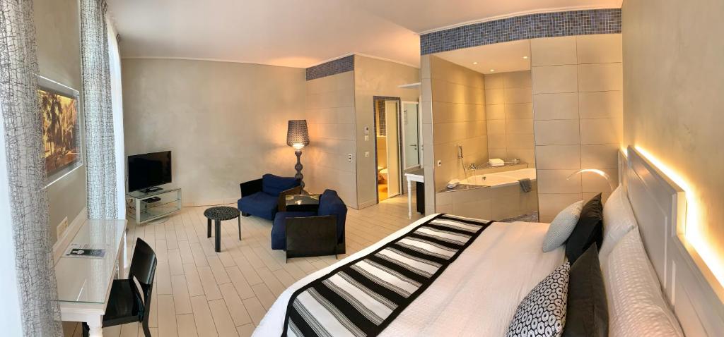 Двухместный (Двухместный номер Делюкс с 2 отдельными кроватями и видом на озеро) отеля Continental Parkhotel, Лугано