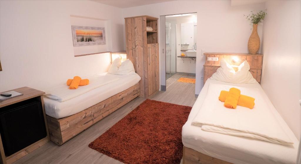 Двухместный (Двухместный номер с 2 отдельными кроватями - Подходит для гостей с ограниченными физическими возможностями) отеля Gasthof Klug zum Ehrensepp, Грац