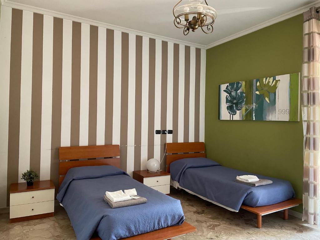 Двухместный (Двухместный номер с 1 кроватью или 2 отдельными кроватями и собственной внешней ванной комнатой) отеля Bed and Breakfast Feel Good, Рим