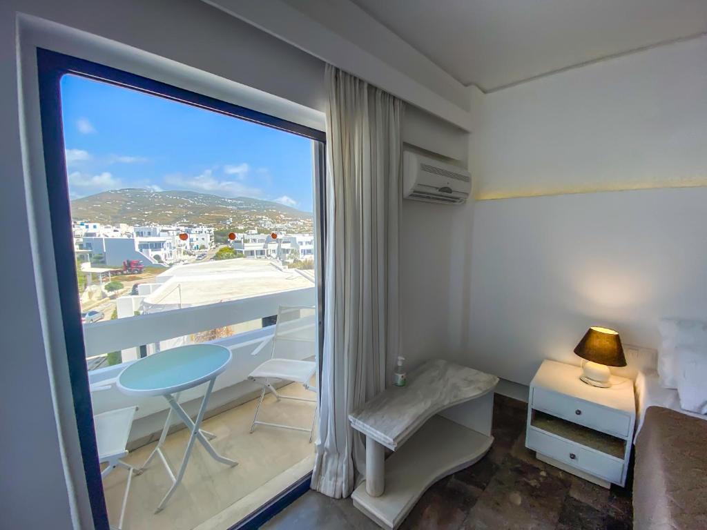 Трехместный (Стандартный трехместный номер) отеля Aeolos Bay Tinos, Тинос