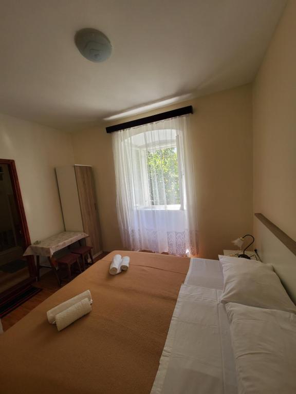 Двухместный (Двухместный номер с 1 кроватью и собственной ванной комнатой) гостевого дома Apartments Dabelić, Полаче
