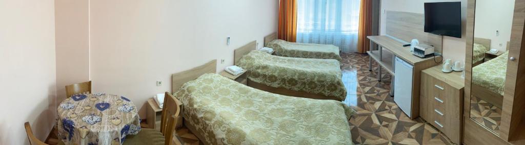 Трехместный (Трехместный номер) отеля Hotel Central Razgrad, Разград