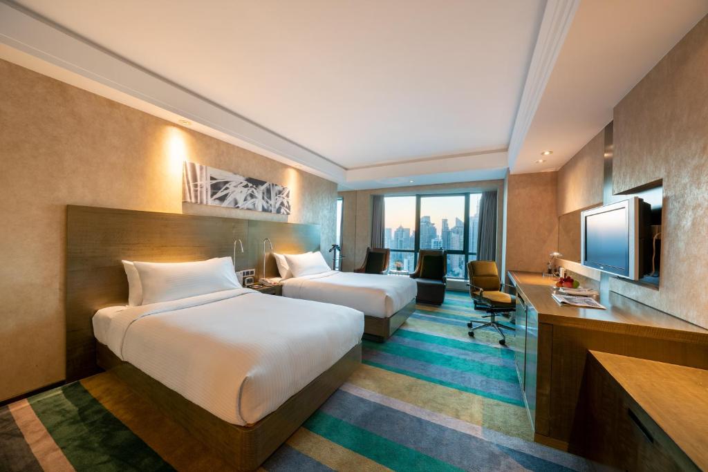 Двухместный (Двухместный номер Делюкс с 2 отдельными кроватями) отеля The Eton Hotel Shanghai, Шанхай