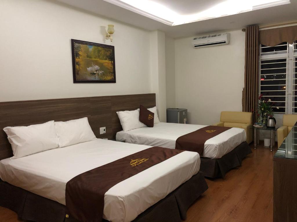 Четырехместный (Номер Делюкс с 2 кроватями размера «queen-size») отеля Minh Hang 3 Hotel, Тхань Хоа