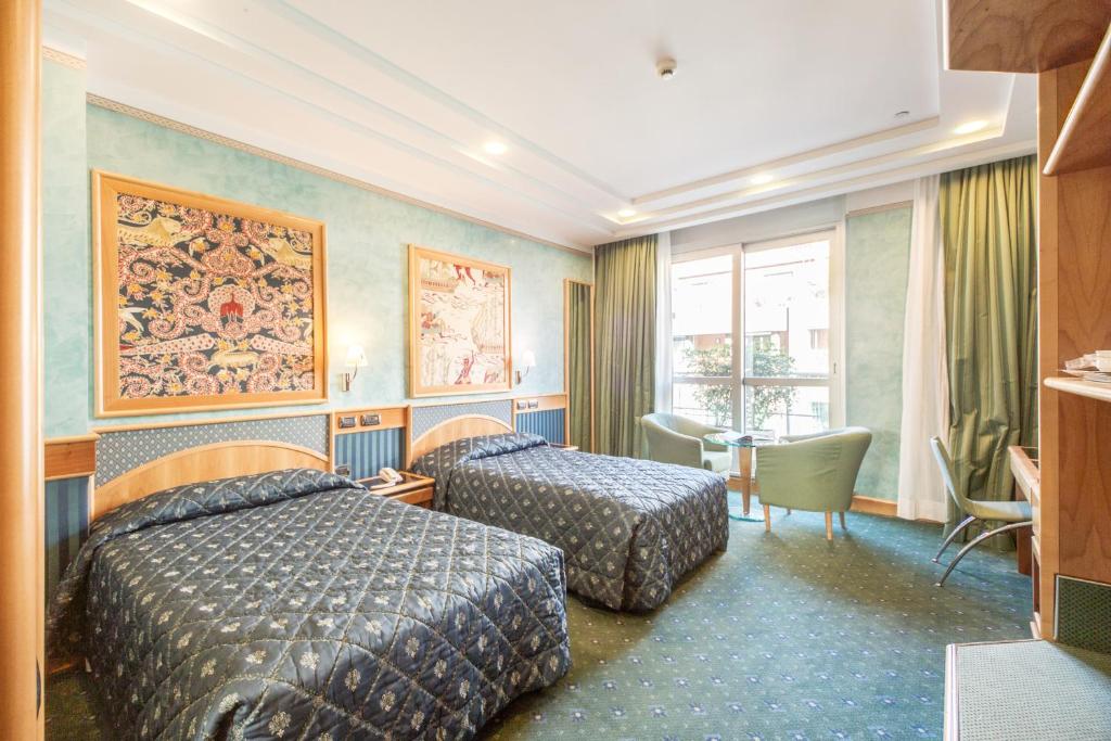 Двухместный (Двухместный номер с 2 отдельными кроватями) отеля Brunelleschi Hotel, Милан