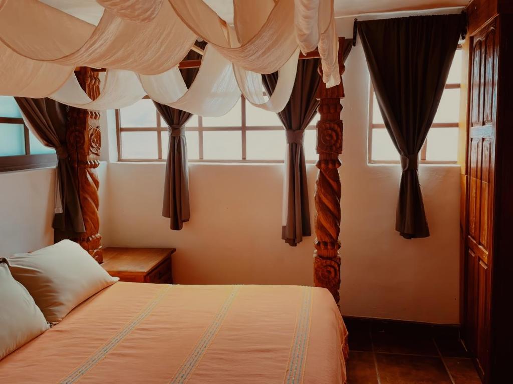 Четырехместный (Двухместный номер с 2 двуспальными кроватями) гостевого дома Casa de Pita, Гуанахуато
