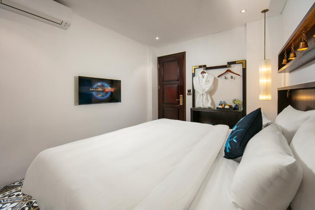 Двухместный (Улучшенный двухместный номер с 1 кроватью или 2 отдельными кроватями) отеля Carillon Boutique Hotel, Ханой
