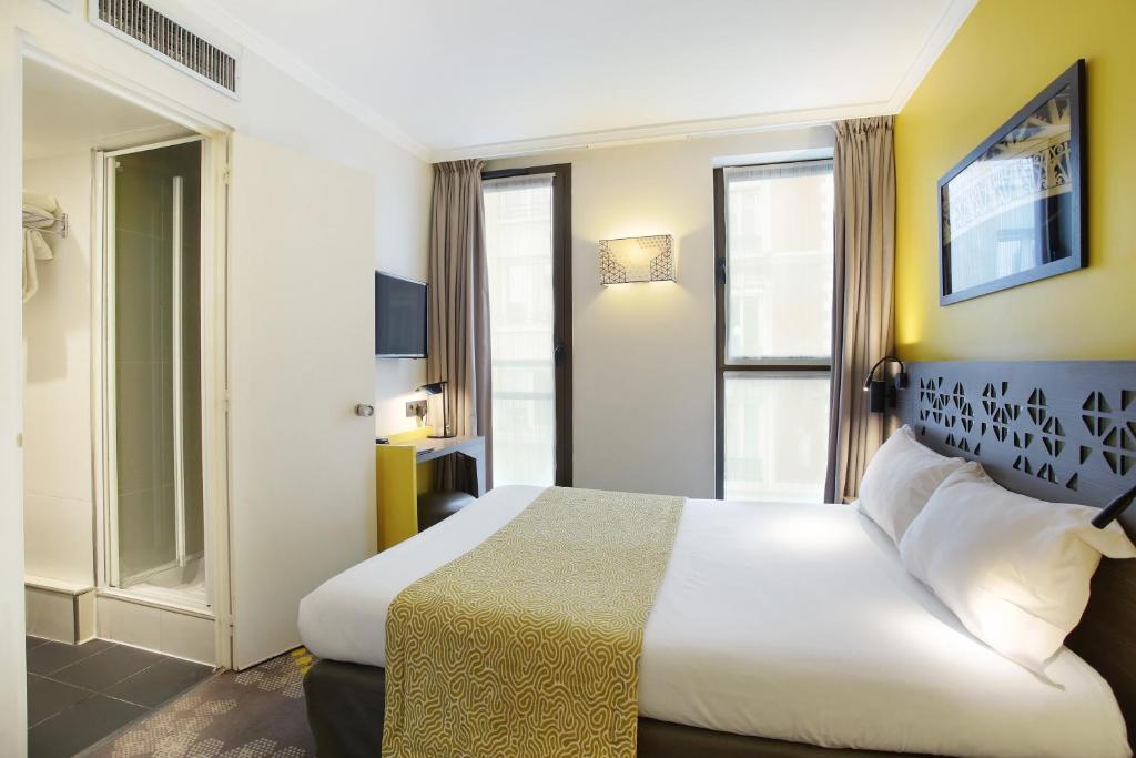 Двухместный (Двухместный номер с 1 кроватью или 2 отдельными кроватями) отеля Hotel Eiffel Capitol, Париж