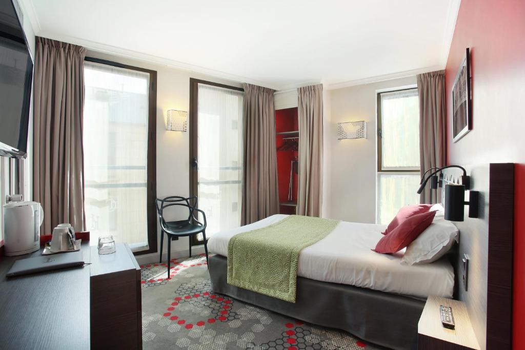 Двухместный (Улучшенный двухместный номер с 1 кроватью или 2 отдельными кроватями) отеля Hotel Eiffel Capitol, Париж