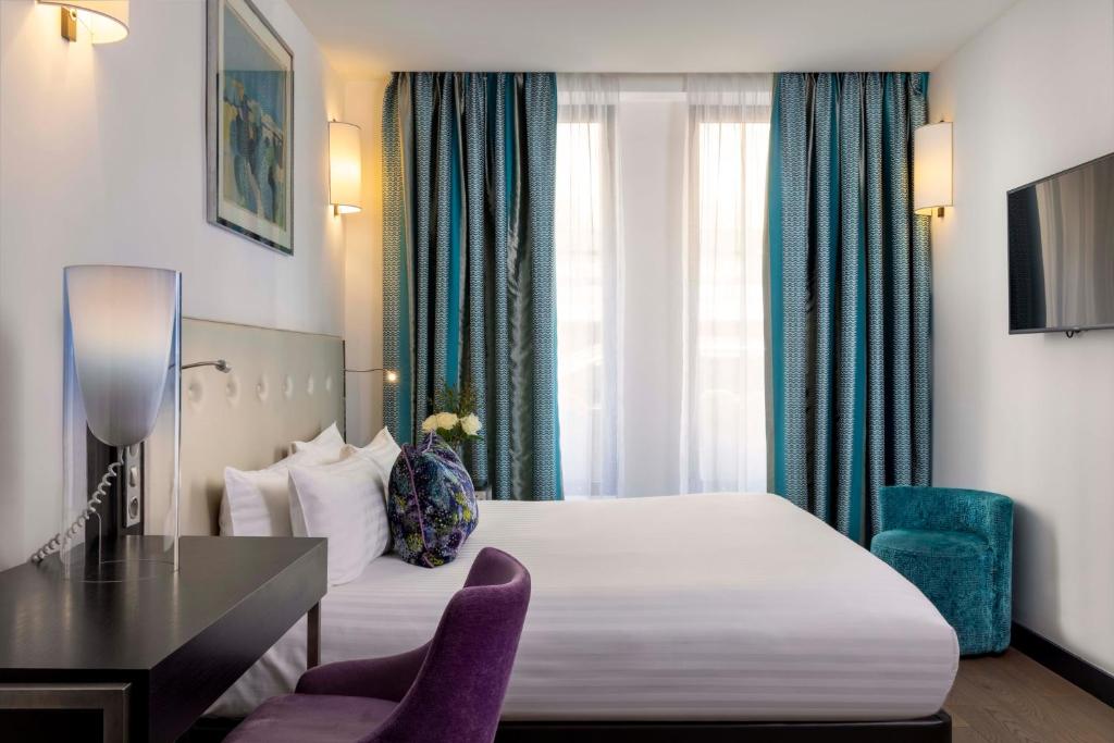 Двухместный (Двухместный номер с 1 кроватью - Подходит для гостей с ограниченными физическими возможностями) отеля Hôtel Gustave, Париж