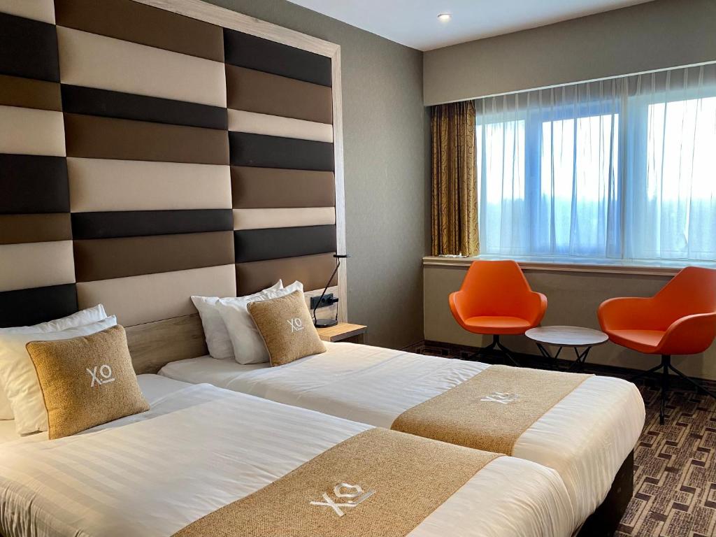 Двухместный (Стандартный двухместный номер с 2 отдельными кроватями) отеля XO Hotels Blue Tower, Амстердам